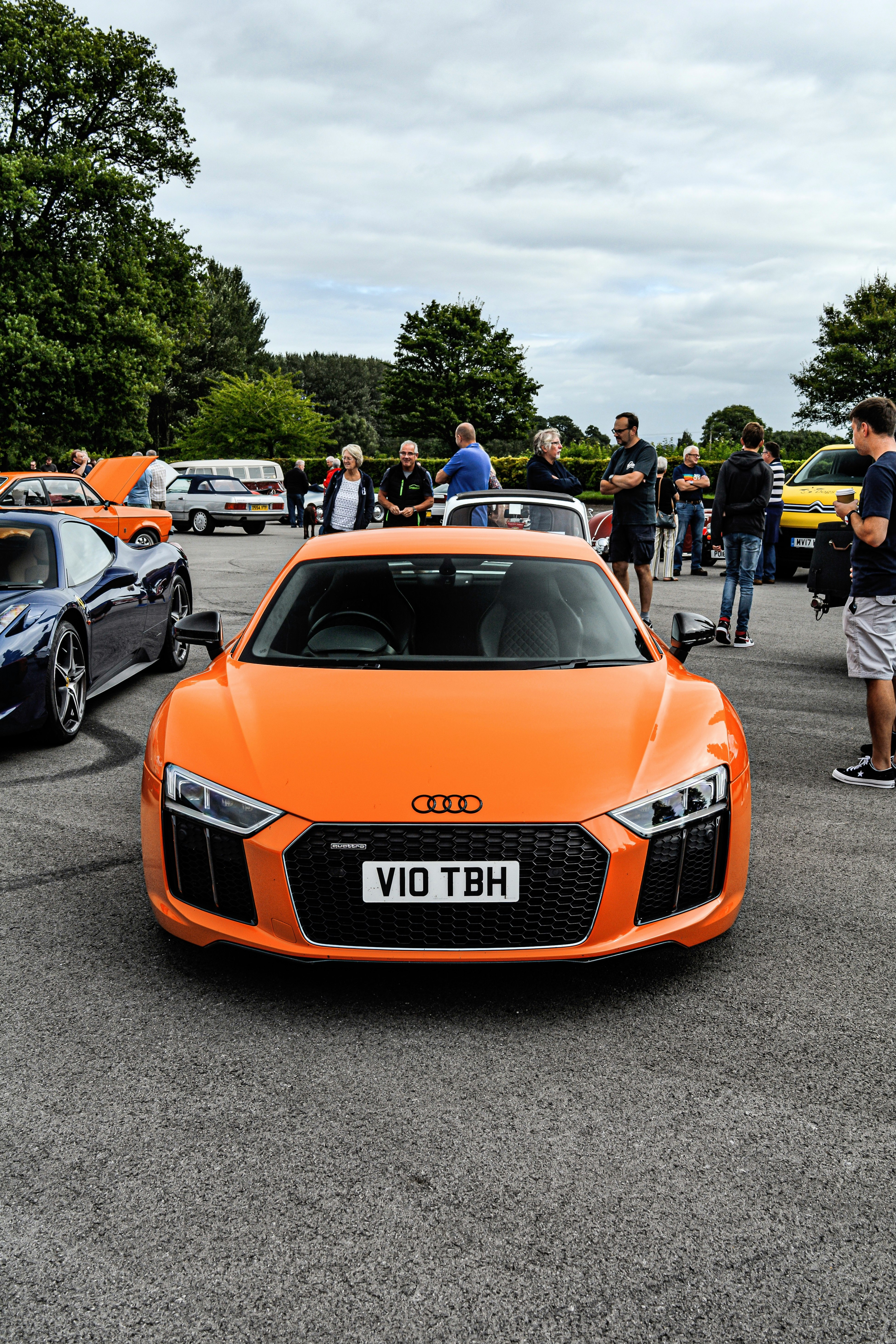 orange audi a 4 on road during daytime